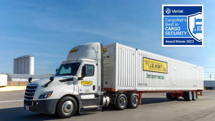 j.b. hunt truck and trailer with cargo award logo in top right corner