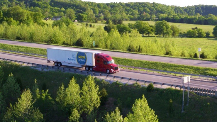 J.B. Hunt 360box tractor trailer traveling down a highway