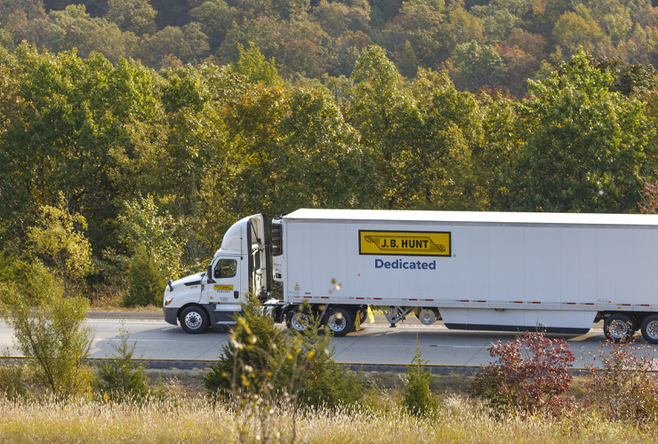 dedicated truck trailer on a highway